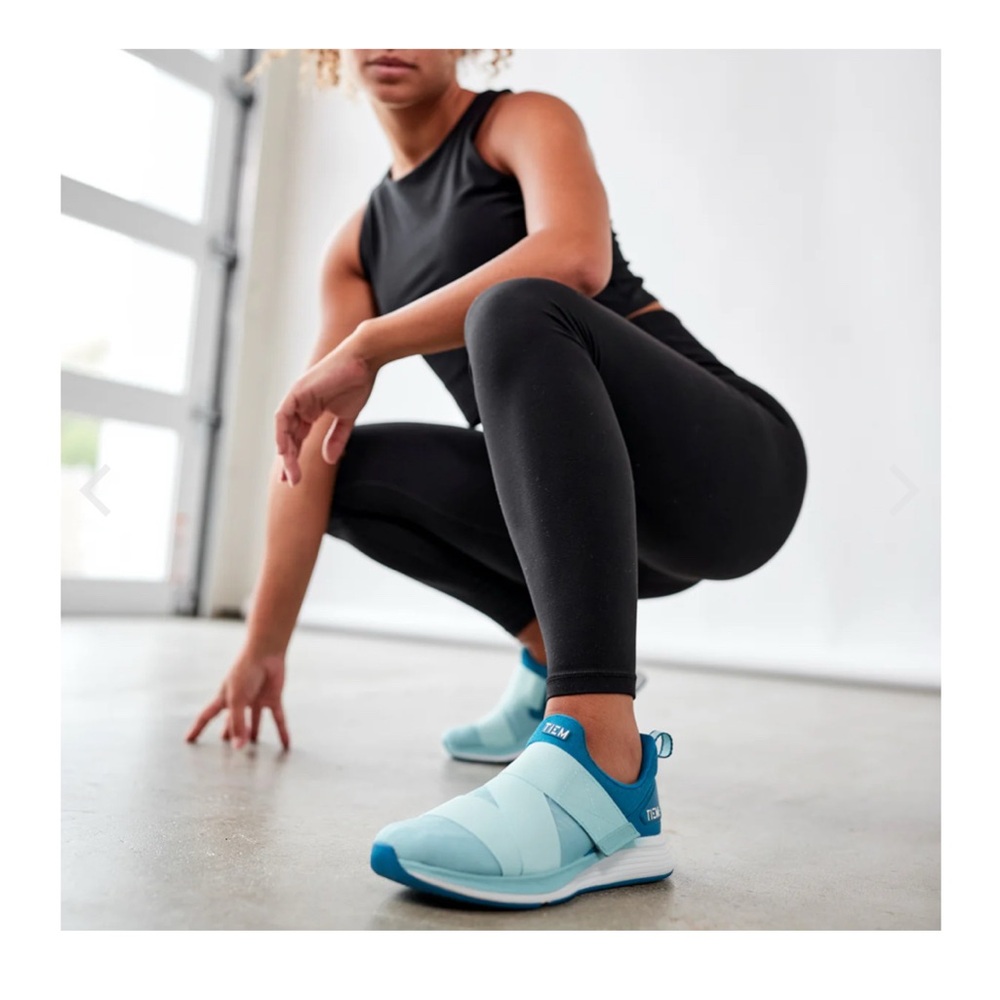Blue Athletic Shoes with Cushioned Sole and Mesh Upper